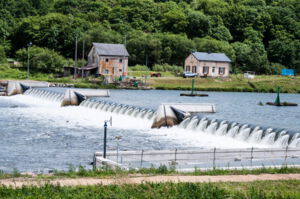 Water-filled three-span rubber dam on the Maas river (France)